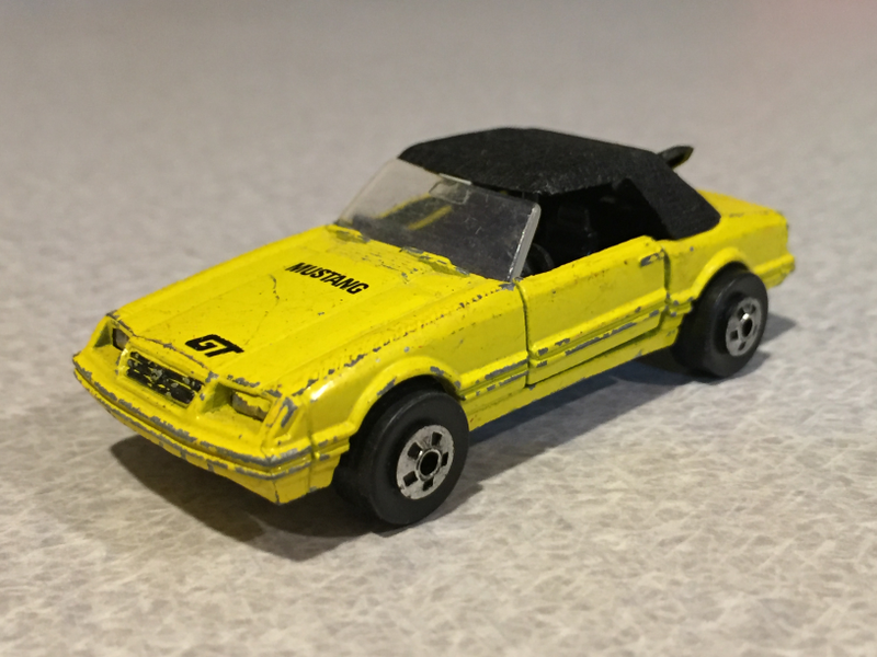 The Road Champs Mustang with the top on.